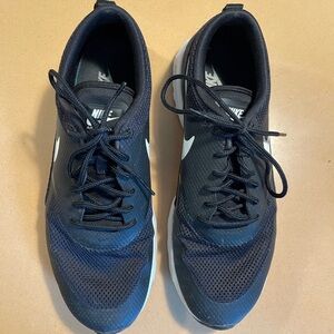 Nike Black and White Athletic Shoes with Mesh Upper